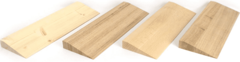 Robotic vacuum cleaner Doorstep ramp made of different types of wood.